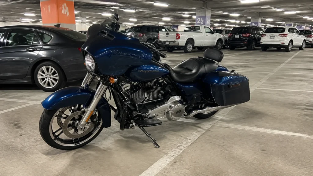 Large motorcycle in a car parking